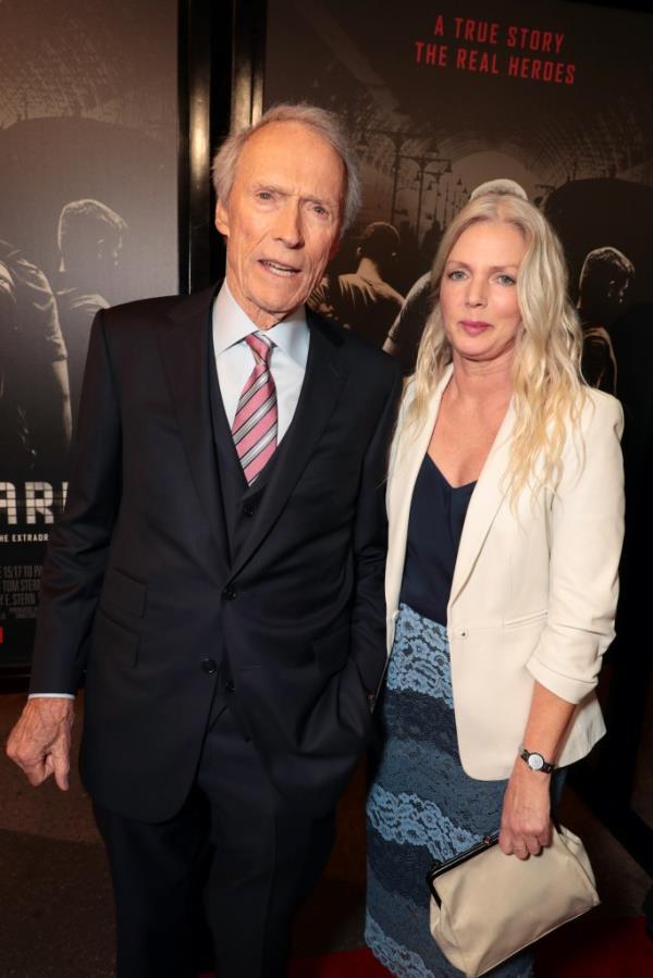 Christina Sandera accompanying Clint Eastwood to "The 15:17 to Paris" premiere in Los Angeles on February 5, 2018.