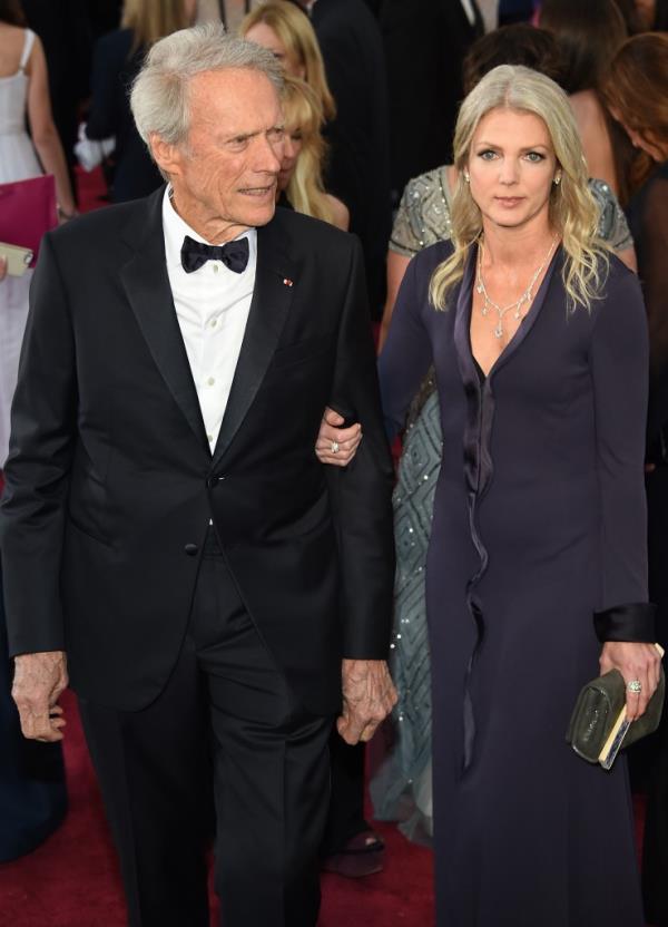 Clint Eastwood and Christina Sandera at the 2015 Academy Awards in Hollywood, California. 