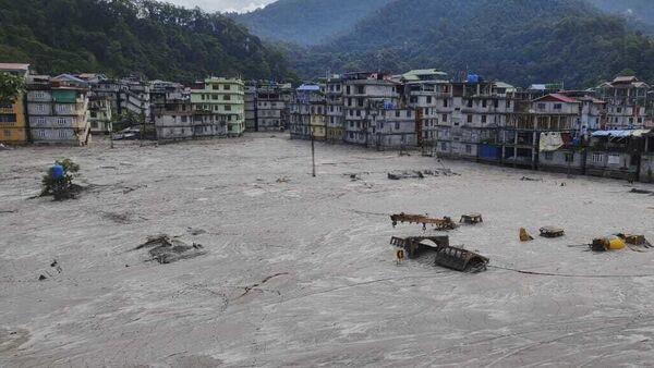 Death toll rises following icy flood after water burst through dam in India