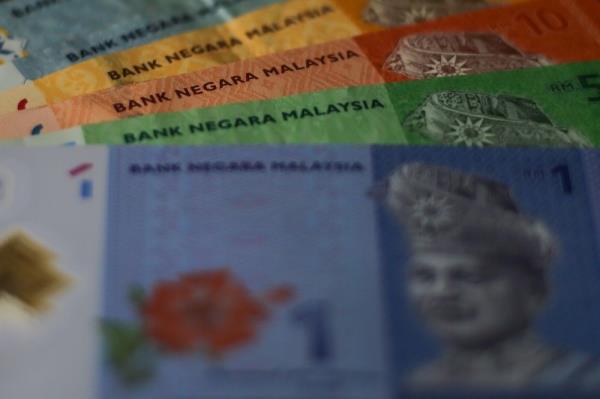 Ringgit opens lower against US dollar, higher versus other currencies